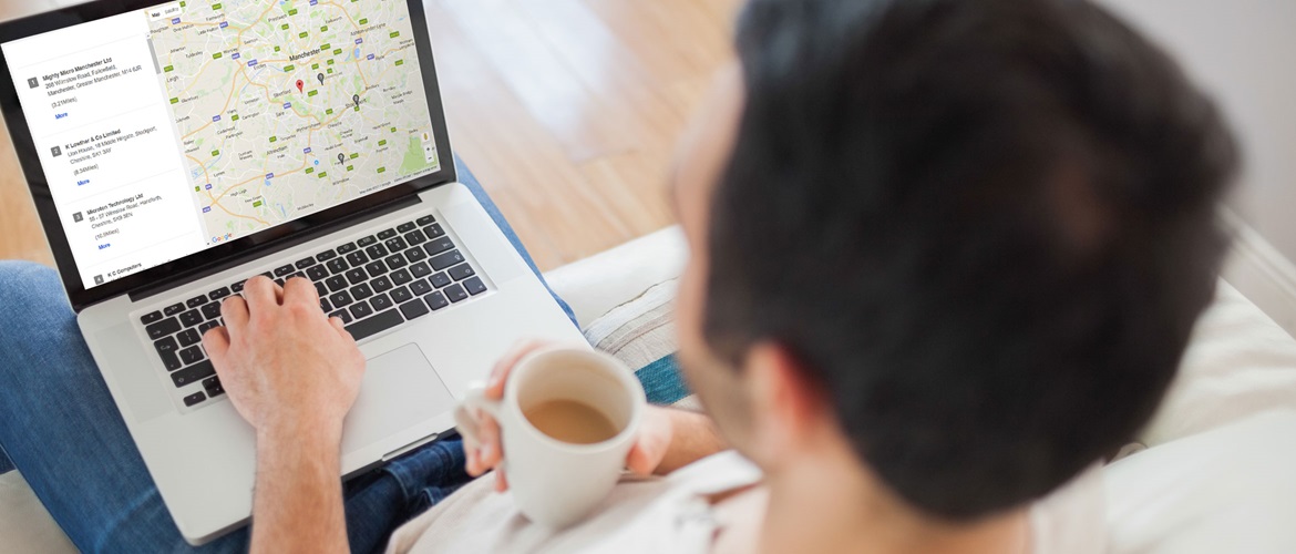 Man searches for Brother local dealers on his laptop